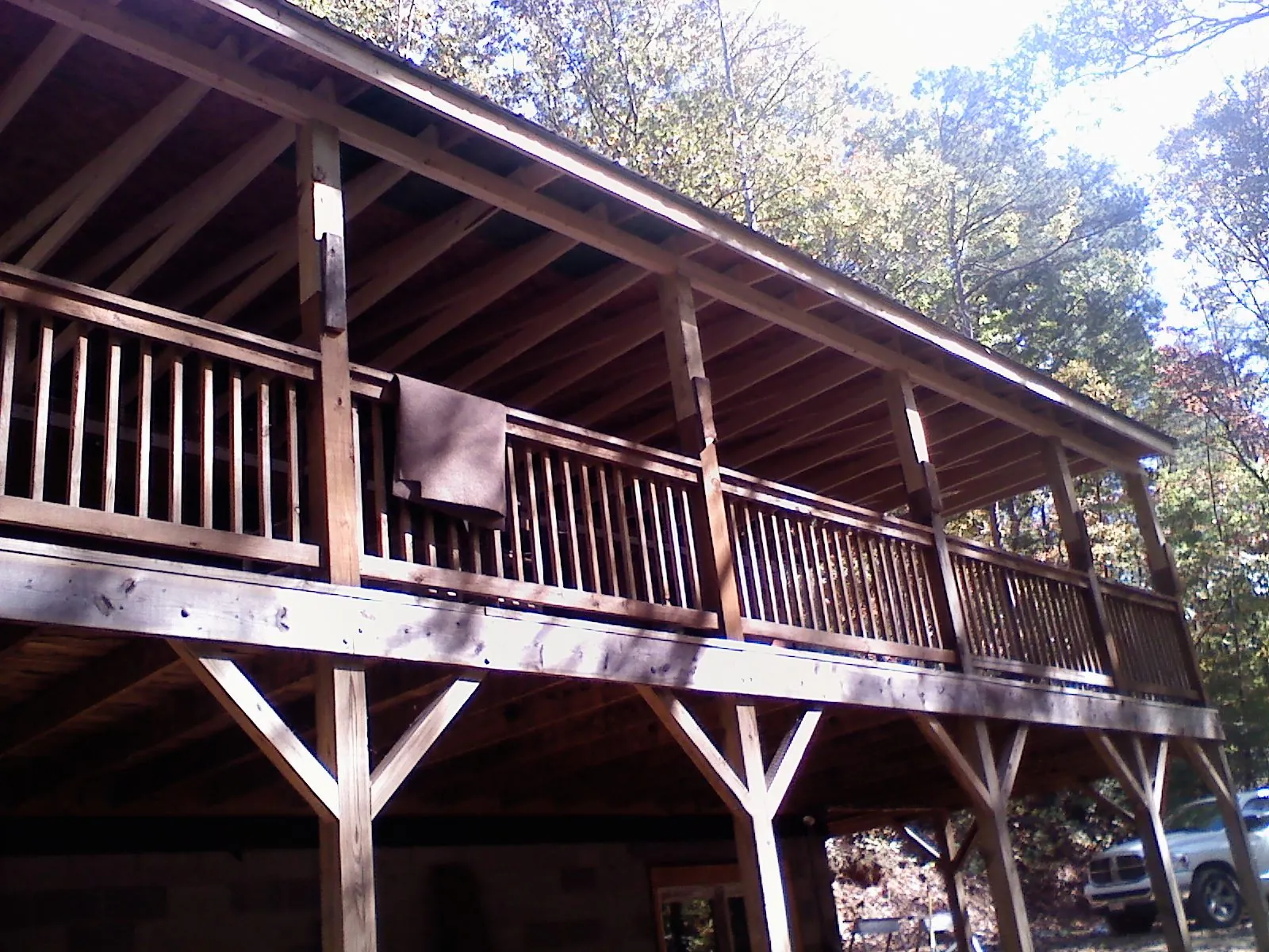 Timber framing under a new elevated porch and deck — Roof Leak Repair in Coalville by Roofing Brothers
